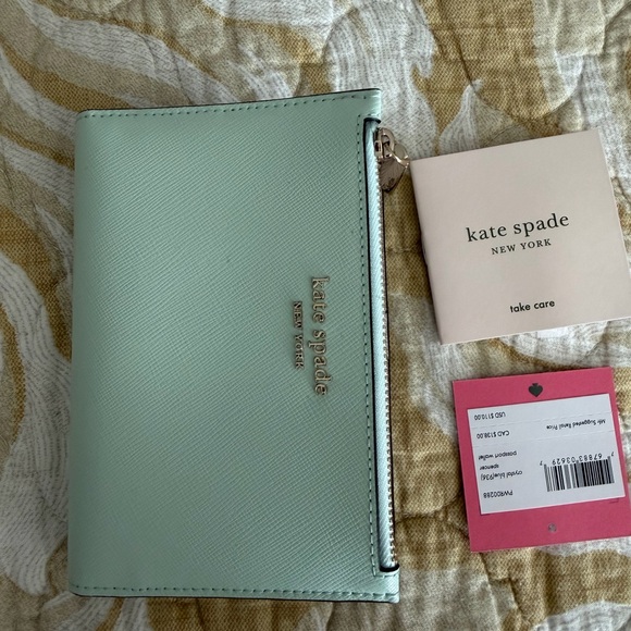 kate spade Accessories - Kate Spade passport Light Green Wallet